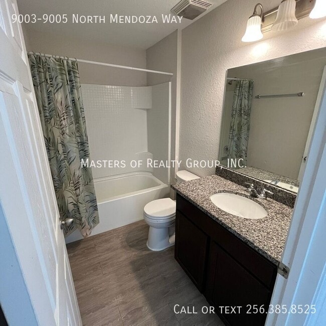 Building Photo - 9003-9005 North Mendoza Way-