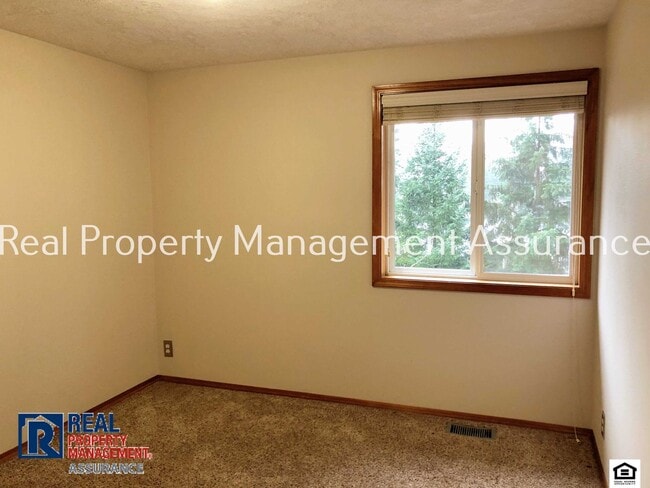 Building Photo - 15520 SW Breccia Dr