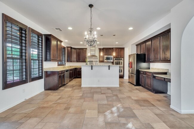 Building Photo - Highly Upgraded SPACIOUS home in desirable Aviano in Desert Ridge!