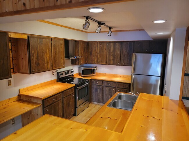 High top seating and wine/coffee bar attached to kitchen - 3320 Louisiana Ave S