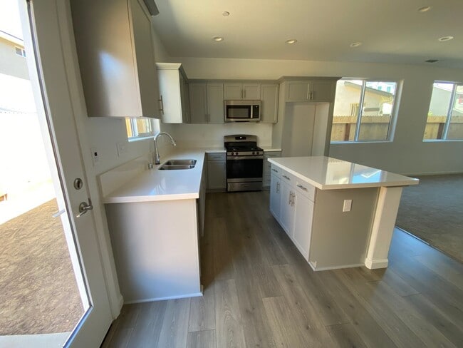 Building Photo - Be the First to Live in This Stunning New ...