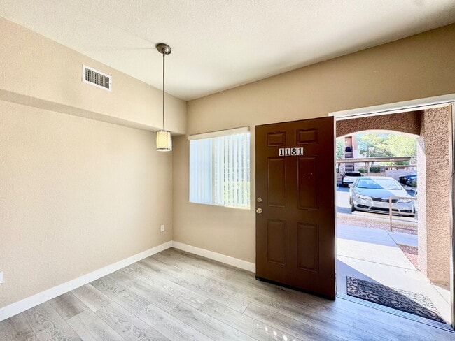 Building Photo - DOWNSTAIRS CONDO | GATED COMMUNITY | CENTENNIAL HILLS | UPDATED 3 BEDROOM