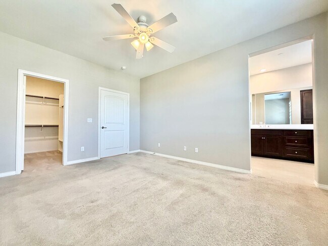 Building Photo - Move-In Ready 2 Bedroom 2.5 Bathroom Condo with LOFT & 2 Car Garage
