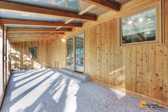 Building Photo - Eagle River Home w/ Fenced Yard, Sunroom, and Garage!