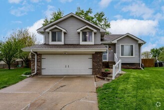 Building Photo - Bright & Airy Tri-Level With Finished Base...