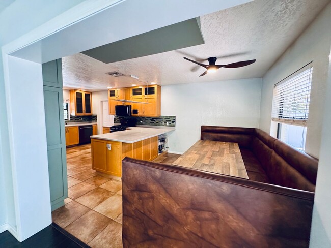 Building Photo - Elegant and Updated 3/2 Pool Home just min...