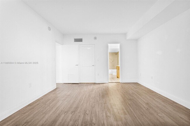 Building Photo - 10275 Collins Ave