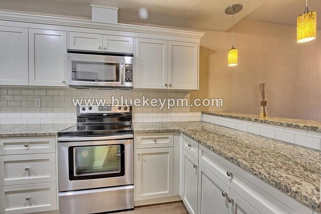Building Photo - 2 Bed, 2 Bath Condo with Roof Top Patio, Covered Balcony and Secure Garage