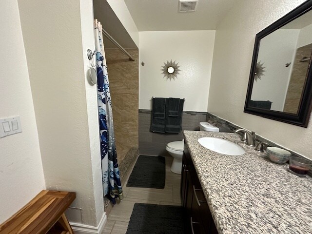 large bathroom with shower - 1140 E Ocean Blvd