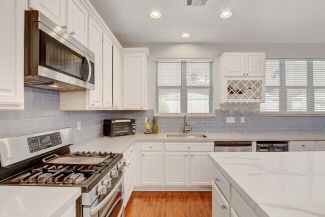 Building Photo - Spacious 4-Bedroom Home for Lease in Gated...