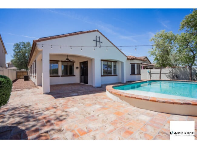 Building Photo - Resort-Style Living in Estrella Mountain Ranch - Private Pool, Solar &amp; Privacy
