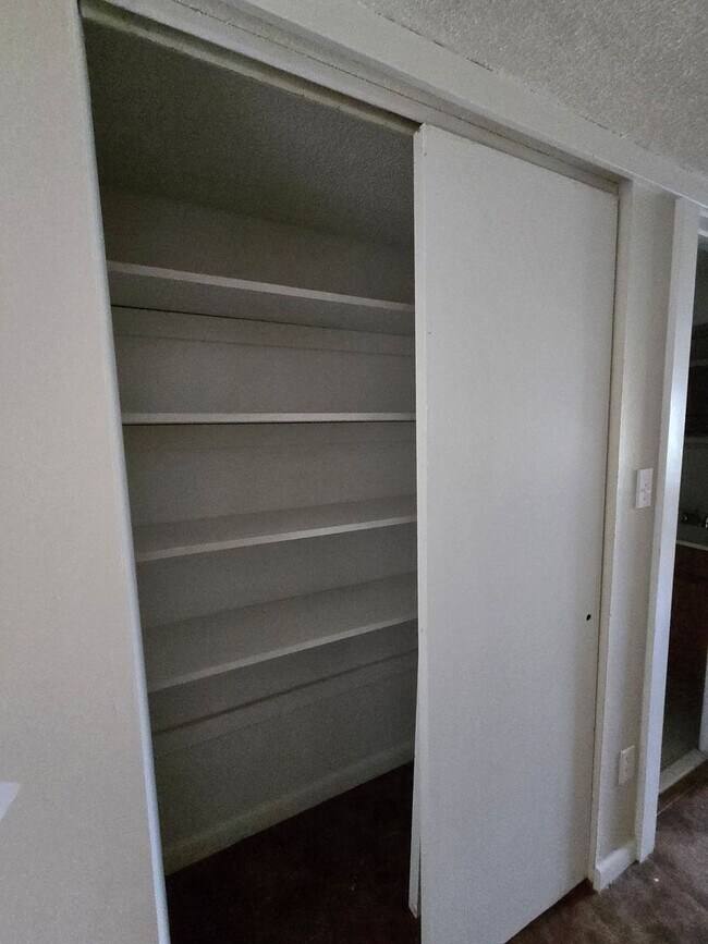 Building Photo - Palms West Condo-Oncu