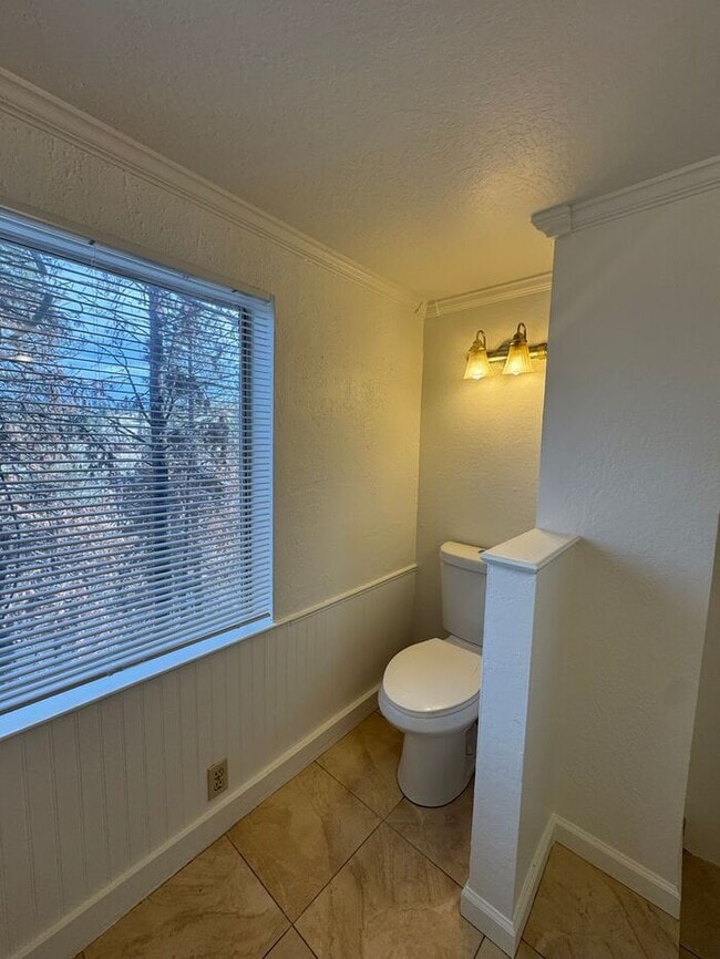 Building Photo - Charming Riverfront Cottage in Verdi – One...