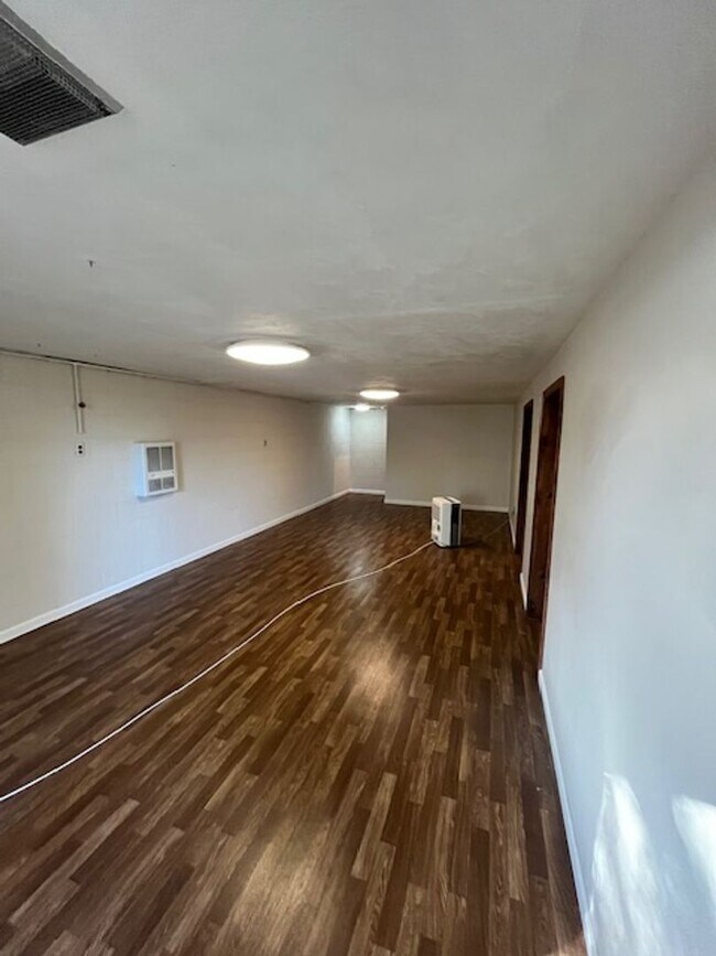 Building Photo - Spacious, Fully Updated Home with Walkout Basement on a Mature Lot