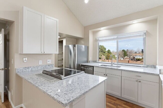 Building Photo - Updated 3-Bedroom Condo with Granite Kitchen in Low-Maintenance Community