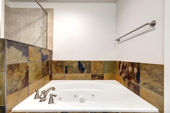Building Photo - Unfurnished Condo Retreat with Modern Comf...