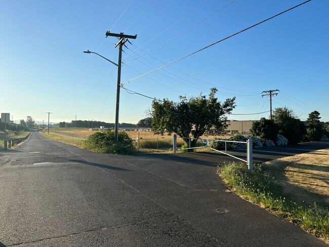 Building Photo - Adorable Quiet park like setting in fruit valley sunsets with landscaping provided