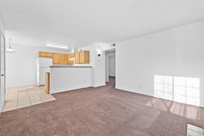 Building Photo - Spacious 2-Bedroom Condo with Fireplace – ...