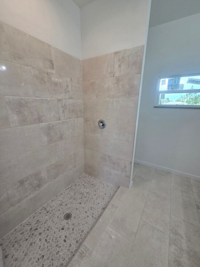 Building Photo - Brand New 3 BEDROOM 2 BATH AND ONE CAR GAR...