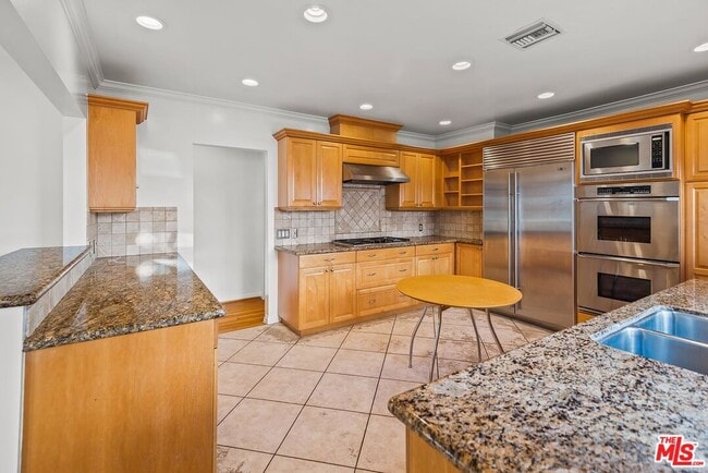 Building Photo - 10497 Kinnard Ave