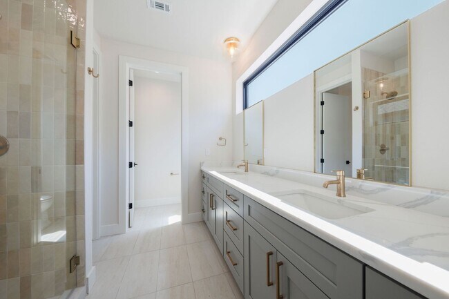 Building Photo - Luxury Redefined: Experience Vibrant Living in this 3-Bedroom Haven in East Austin