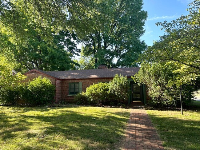 Primary Photo - Classic All-Brick Home with Cozy Fireplace...