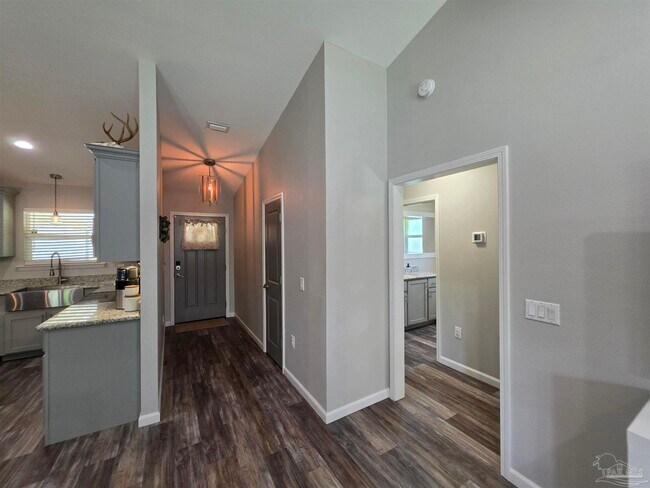 Building Photo - 5565 Riviera Dr