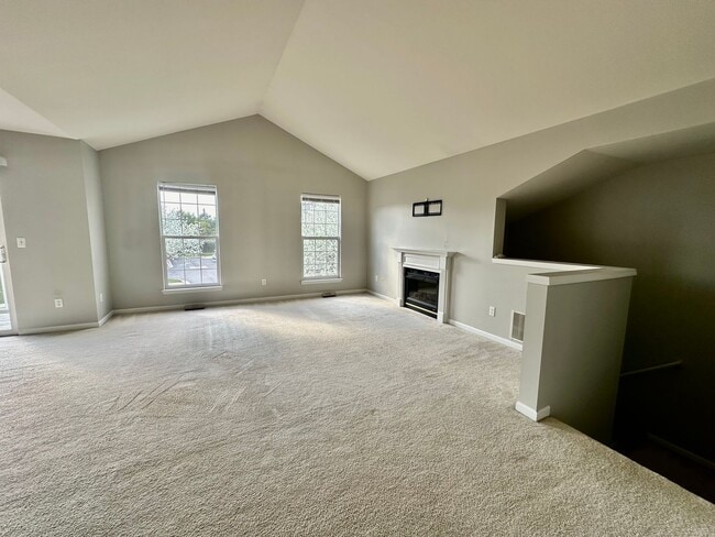 Building Photo - Just Listed! Sun-Filled 2BR Condo with Fireplace & Garage – Won’t Last!