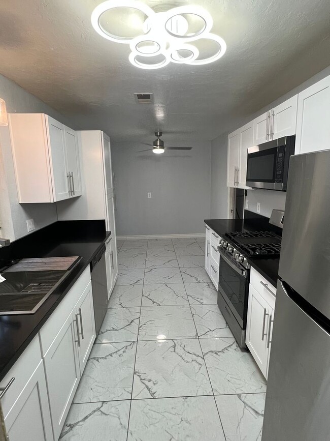 Building Photo - Huge 2 story 8 bed room Home: a hop and a skip from SDSU!  You will never be late to class!