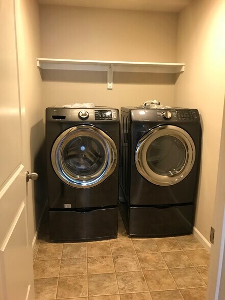 W & D upstairs in utility room between master & beds 2 & 3. - 8828 Jayden Ln NE