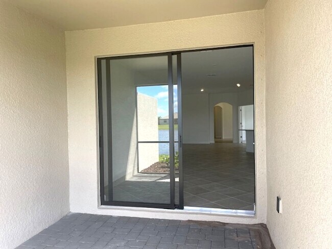 Building Photo - New Construction 2 Bedroom PLUS a Home Office Available in Lorraine Lakes