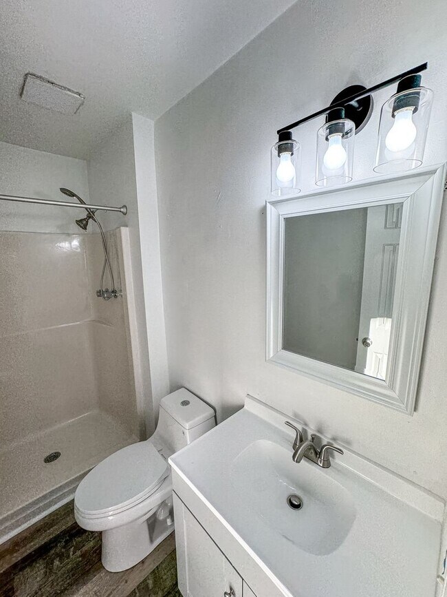 Building Photo - Introducing our spacious townhouse located...