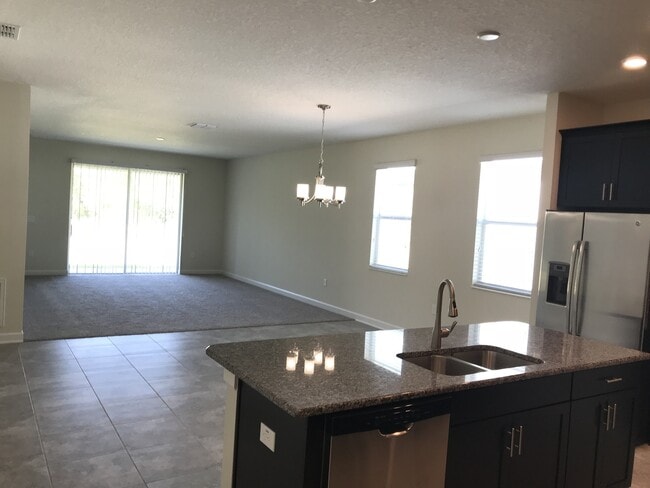 Building Photo - NEWER 3/2 Plus Den Home at The Oaks in Mos...