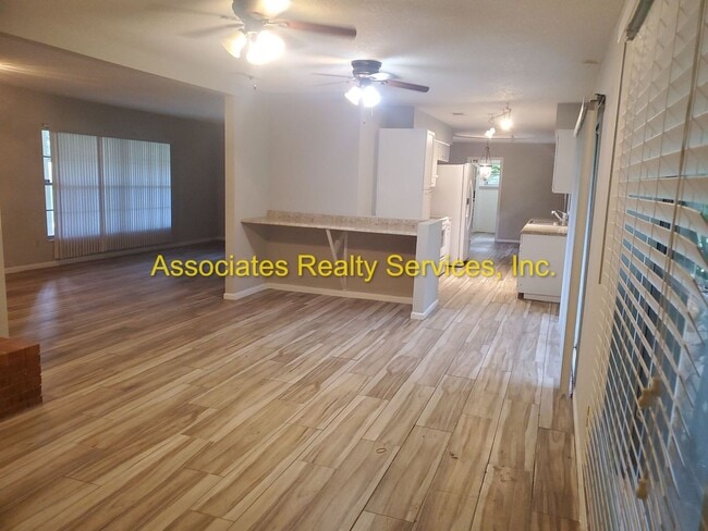 Building Photo - Three bedroom, two bath - 1720 Sq. ft., Acre lot