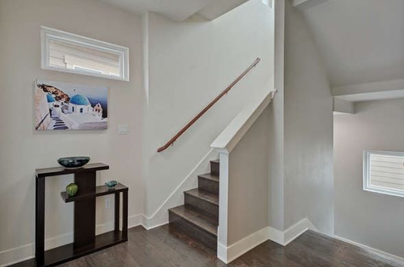 Stairs up to bedrooms and down to garage - 1916 tripshaw lane