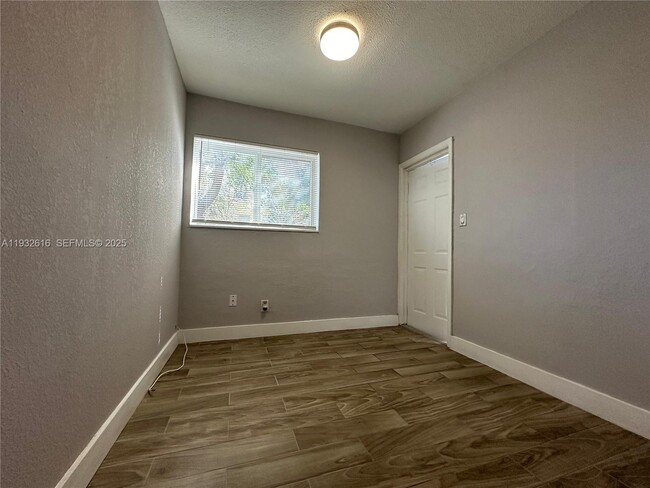 Building Photo - 647 NW 3rd Ave