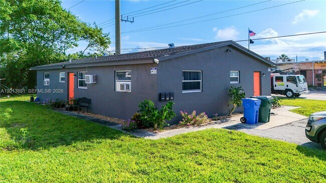 Building Photo - 391 NE 42nd Ct