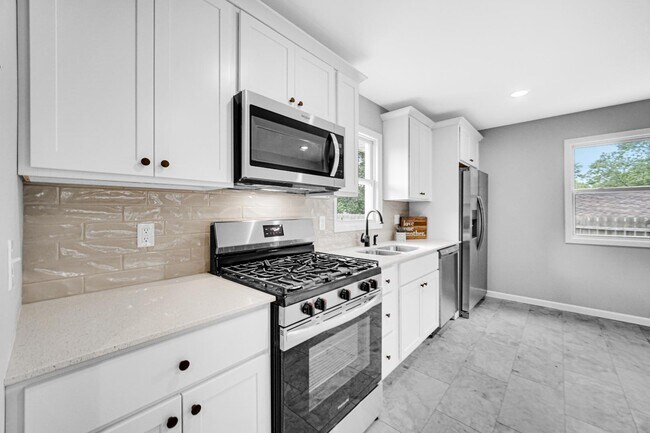 Building Photo - 3413 W 77th Ave