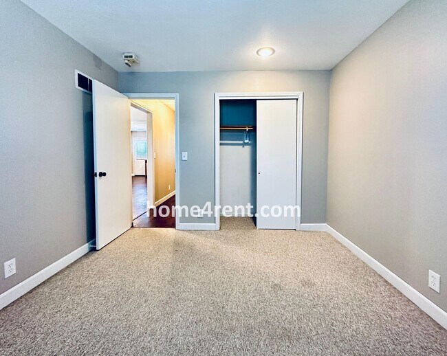 Building Photo - Updated Kitchen, Composite Deck and Refrig...
