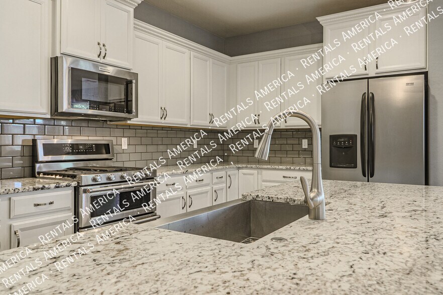 Building Photo - 10910 E Calypso Ave