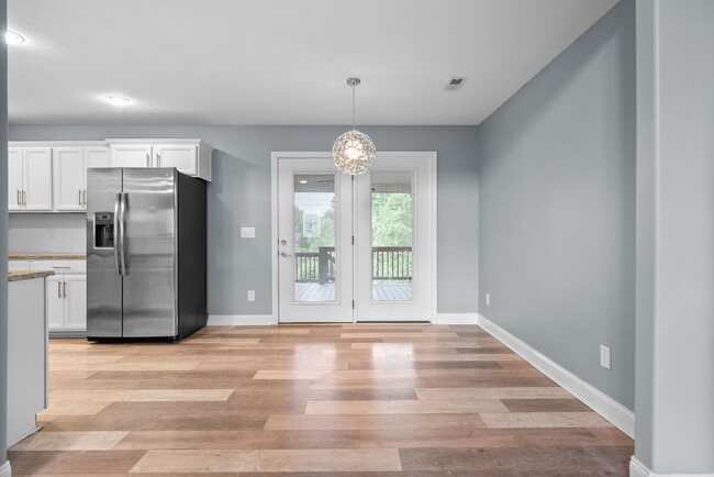Building Photo - Pet Friendly Three Bedroom with Bonus!