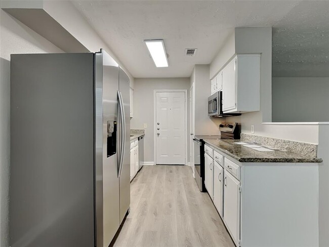 Building Photo - 7047 Rockergate Dr
