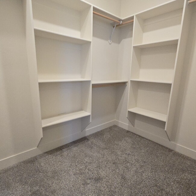 Building Photo - Move-in ready! 4 bedroom house with 3 car ...