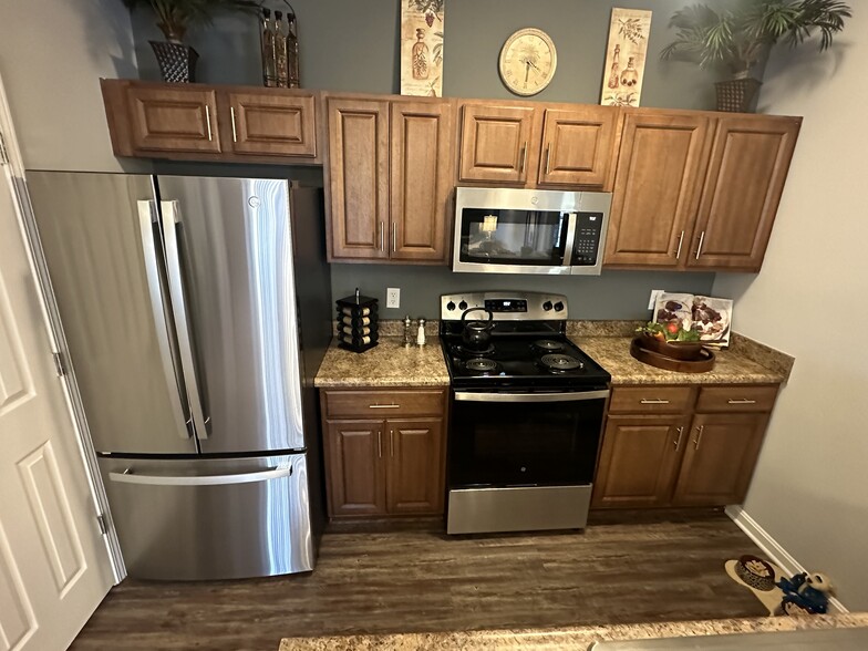 One Bedroom Kitchen with New Stainless Steel Appliances - Blankenbaker Crossings Apartment Homes