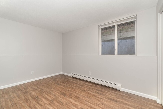 Building Photo - City Living, Made Effortless — Your New Favorite Place to Call Home