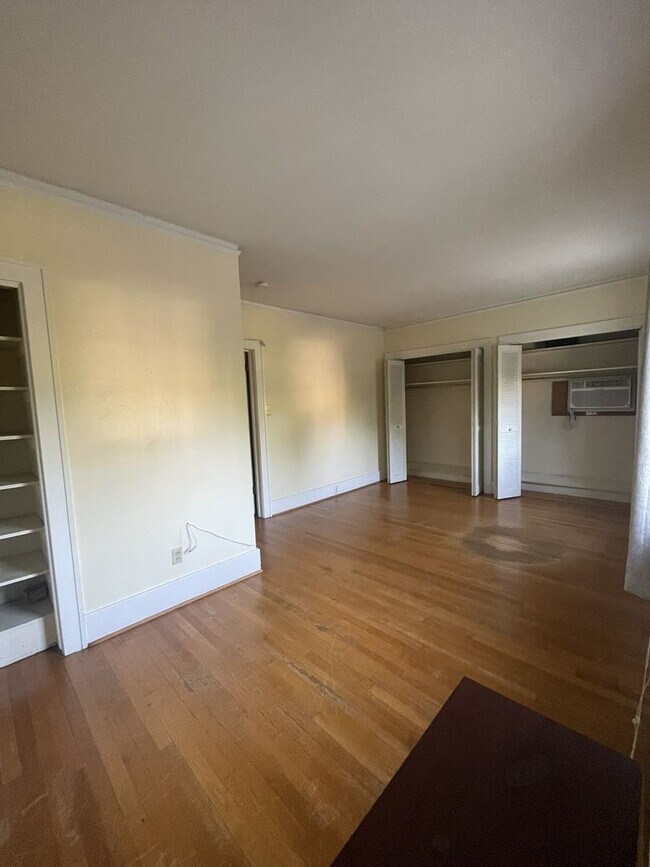 Building Photo - One Block to the Diag! Charming Home with Private Courtyard + Parking