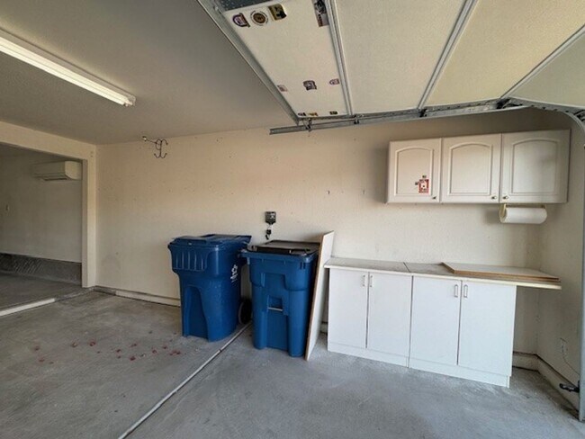 Building Photo - 2BR + 2 BONUS ROOMS with 54 foot Long Boat/Toys DEEP Garage