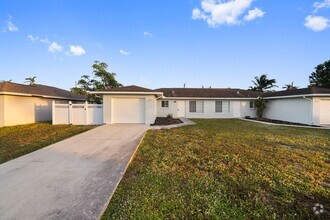 Building Photo - ANNUAL RENTAL - 2 Bedroom, 1 Bath w/ Garag...