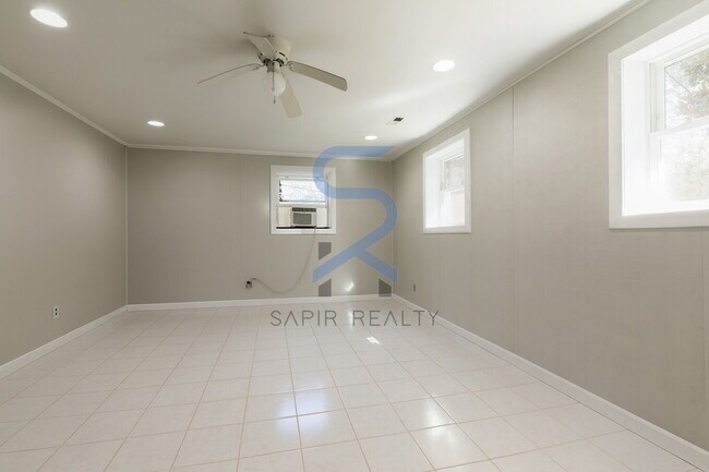 Building Photo - Move in before December 15th and choose your reward: a $250 Amazon Gift Card or a 55" Smart TV!