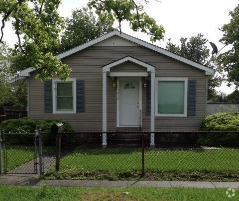 large front yard  and backyard with off street parking - 1012 Merrill St